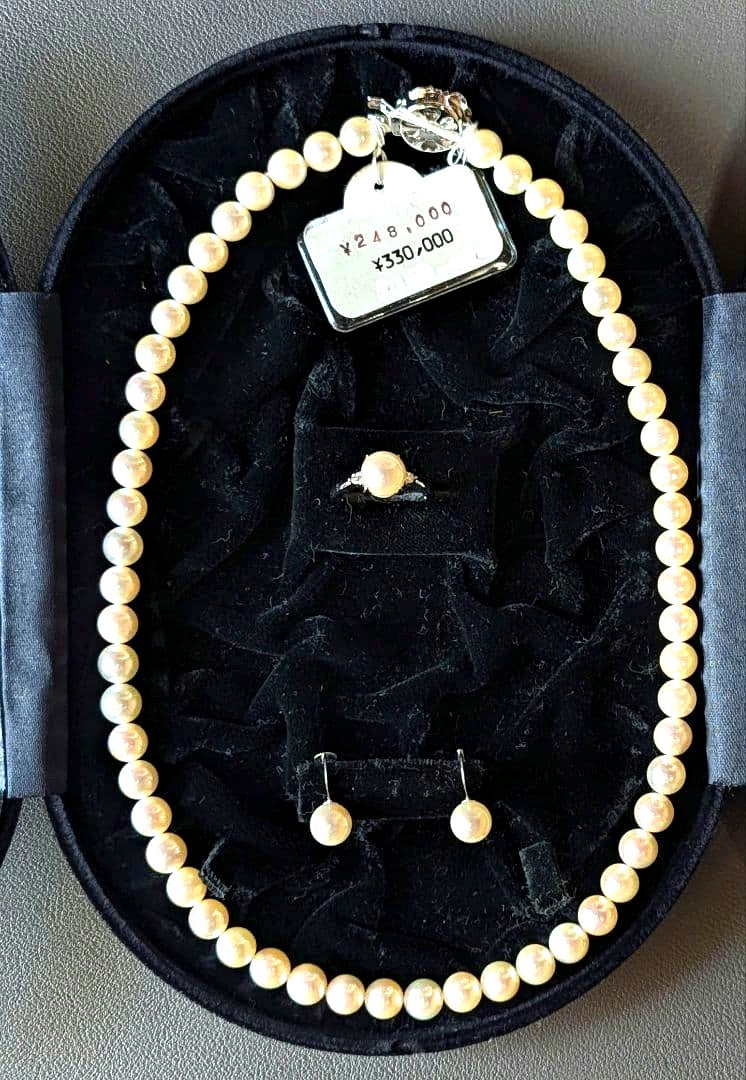 Akoya pearl necklace, platinum ring size 11, and matching earrings set with silver clasp