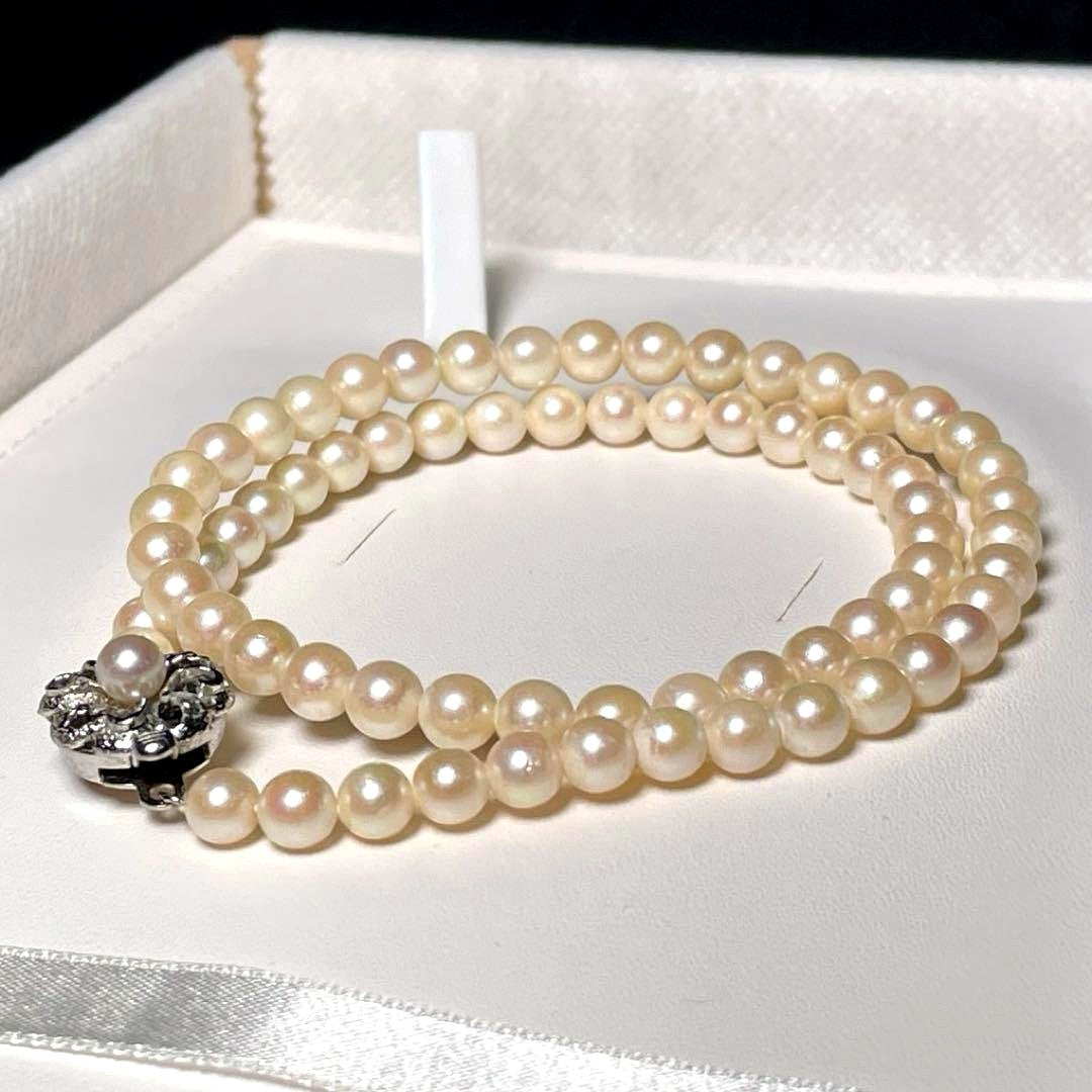 Akoya pearl baby pearl necklace with 5.5-5.9mm round white pearls on a 42.1cm silver chain