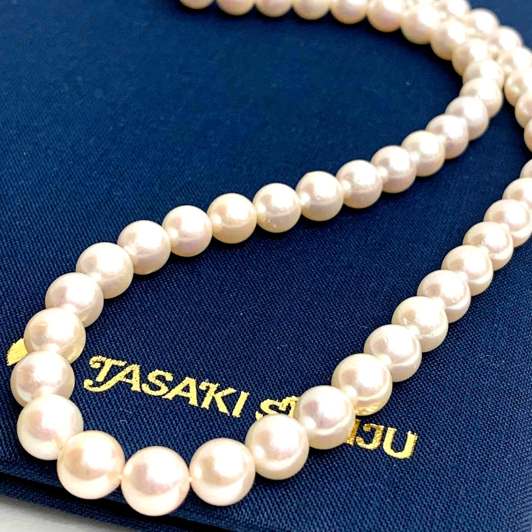 Tasaki pearl necklace with 7.5-8.0mm pearls on a 42cm silver chain with guarantee tag