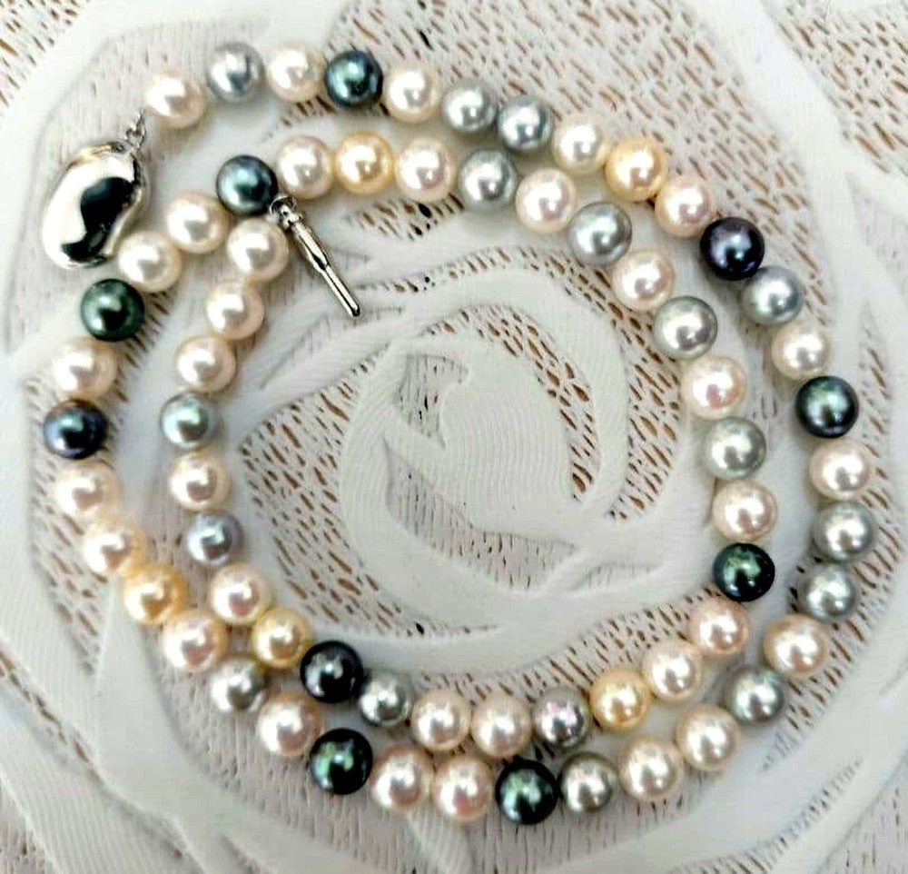 Akoya pearl necklace with 6mm round white, gold, green, and light gray pearls on a 42.5cm strand with silver push clasp