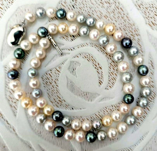 Akoya pearl necklace with 6mm round white, gold, green, and light gray pearls on a 42.5cm strand with silver push clasp