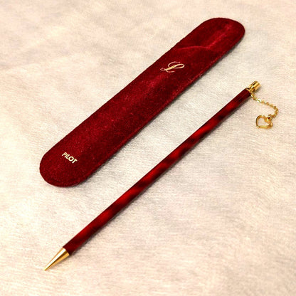 PILOT Mechanical Pencil in red tortoise marble pattern with gold accents and heart charm, displayed with velvet pen case and cloth box