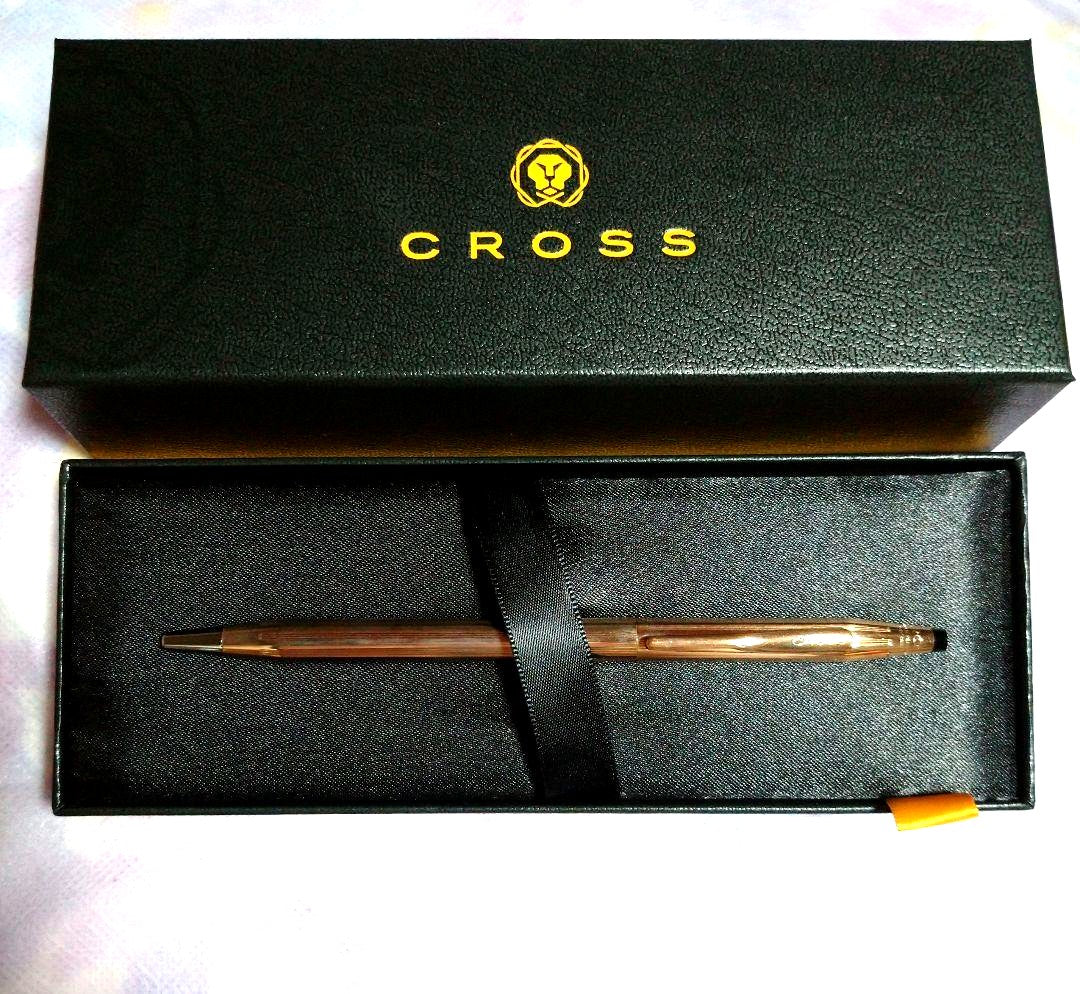 Kuro Century ballpoint pen with 10-karat gold plating and conical cap top by Cross