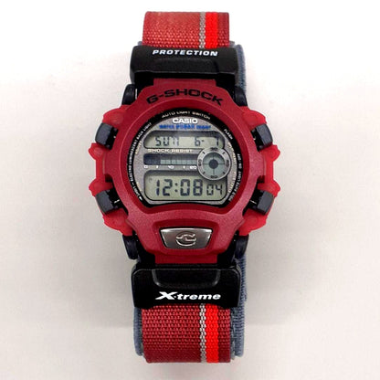 Casio DW-004 G-Shock watch with replaced battery, showing bezel damage and faded band