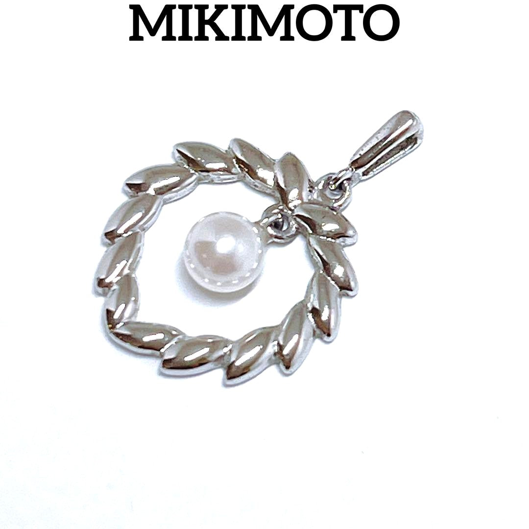Mikimoto Pearl Necklace Top Leaf made of silver with pearl accent, delicate and elegant design