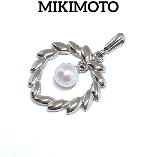 Mikimoto Pearl Necklace Top Leaf made of silver with pearl accent, delicate and elegant design