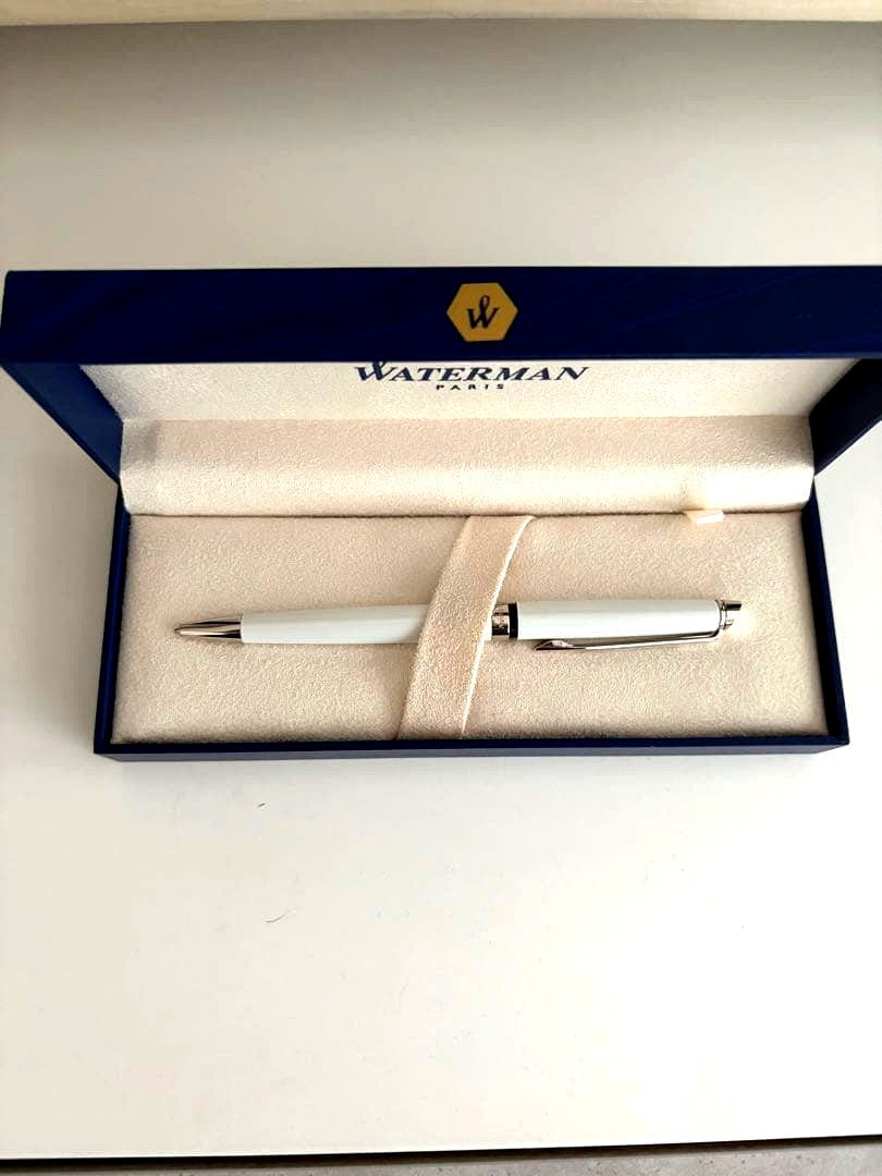Waterman ballpoint pen with black ink, shown with its box on a white background