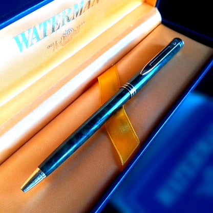 Waterman Exclusive ballpoint pen with black ink refill resting in an open France case