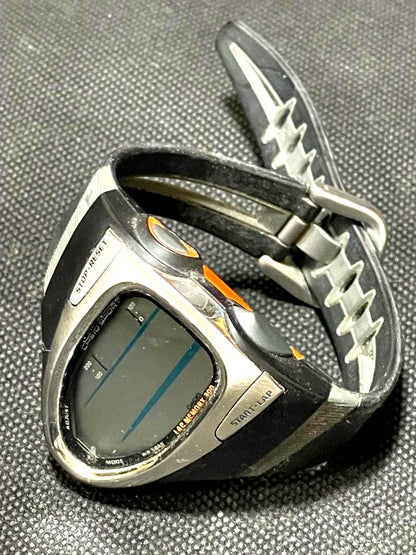 Casio Phys Series CHR-200J digital watch with black and orange design and stainless steel back