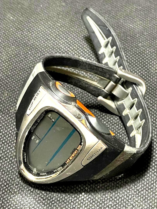 Casio Phys Series CHR-200J digital watch with black and orange design and stainless steel back