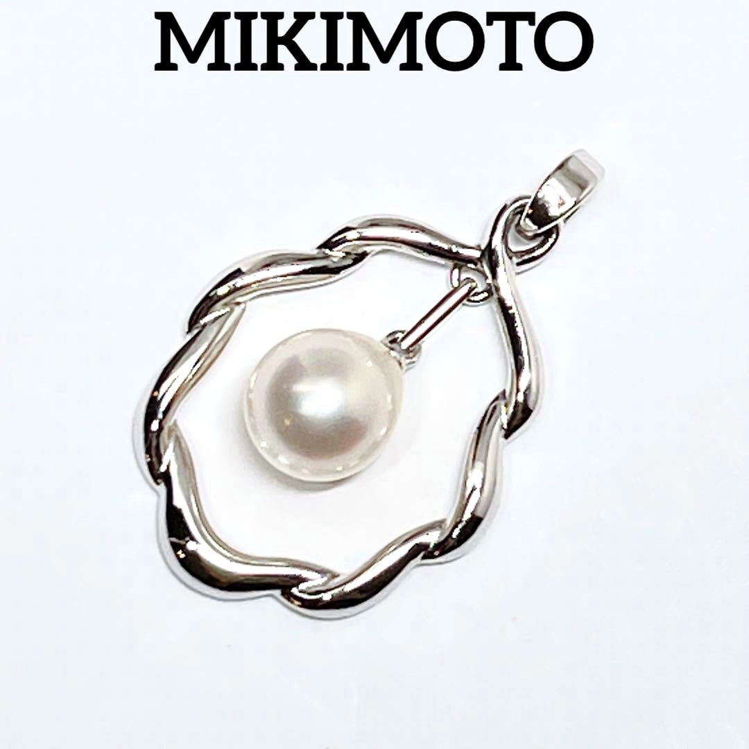 Mikimoto Pearl Pendant Top with 7.1 x 7.5 mm pearl set in silver, displayed on white background