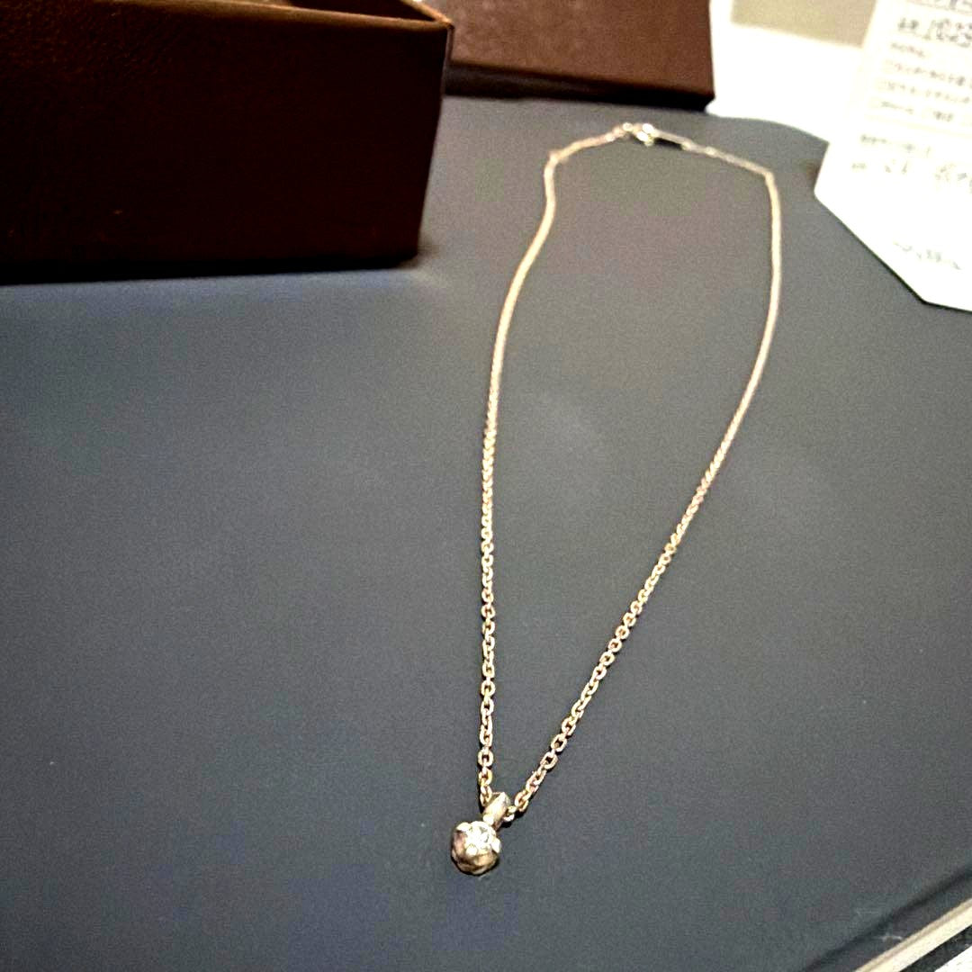Agete silver necklace featuring sparkling diamonds with no visible damage or discoloration
