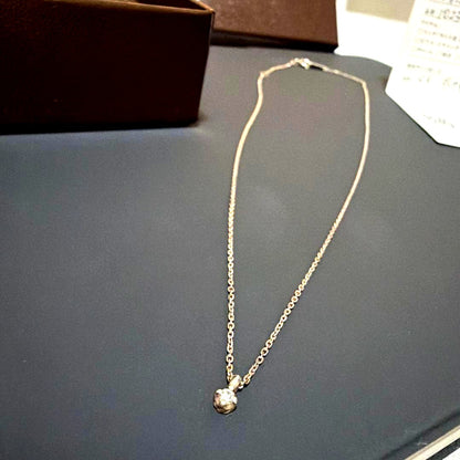 Agete silver necklace featuring sparkling diamonds with no visible damage or discoloration
