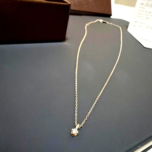 Agete silver necklace featuring sparkling diamonds with no visible damage or discoloration