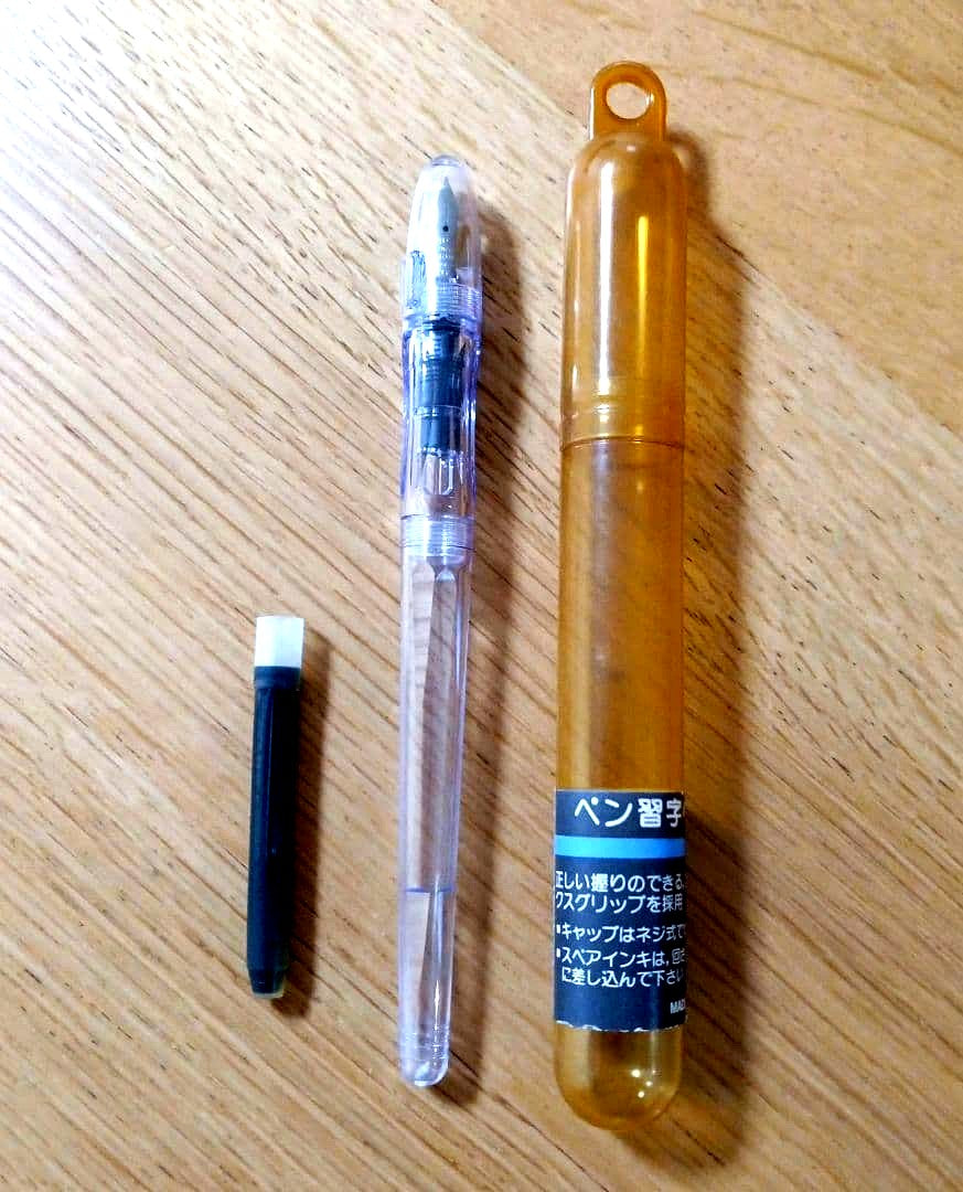 Pilot Penmanship clear fountain pen with extra fine nib, includes case and ink, new and unused