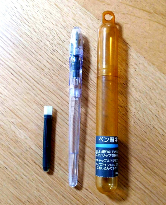 Pilot Penmanship clear fountain pen with extra fine nib, includes case and ink, new and unused