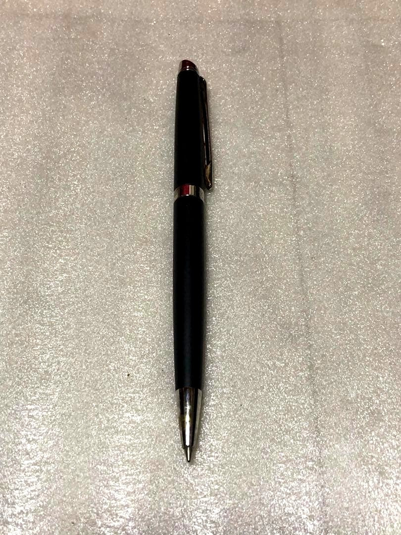 Sleek Waterman ballpoint pen with black barrel and silver clip on a white background