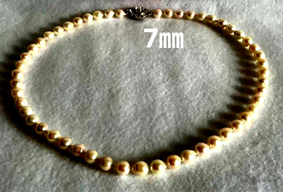 Untreated genuine 7mm pearl necklace in silver with 44cm length shown on white background