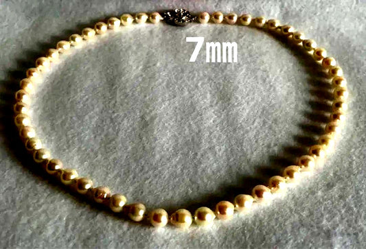 Untreated genuine 7mm pearl necklace in silver with 44cm length shown on white background
