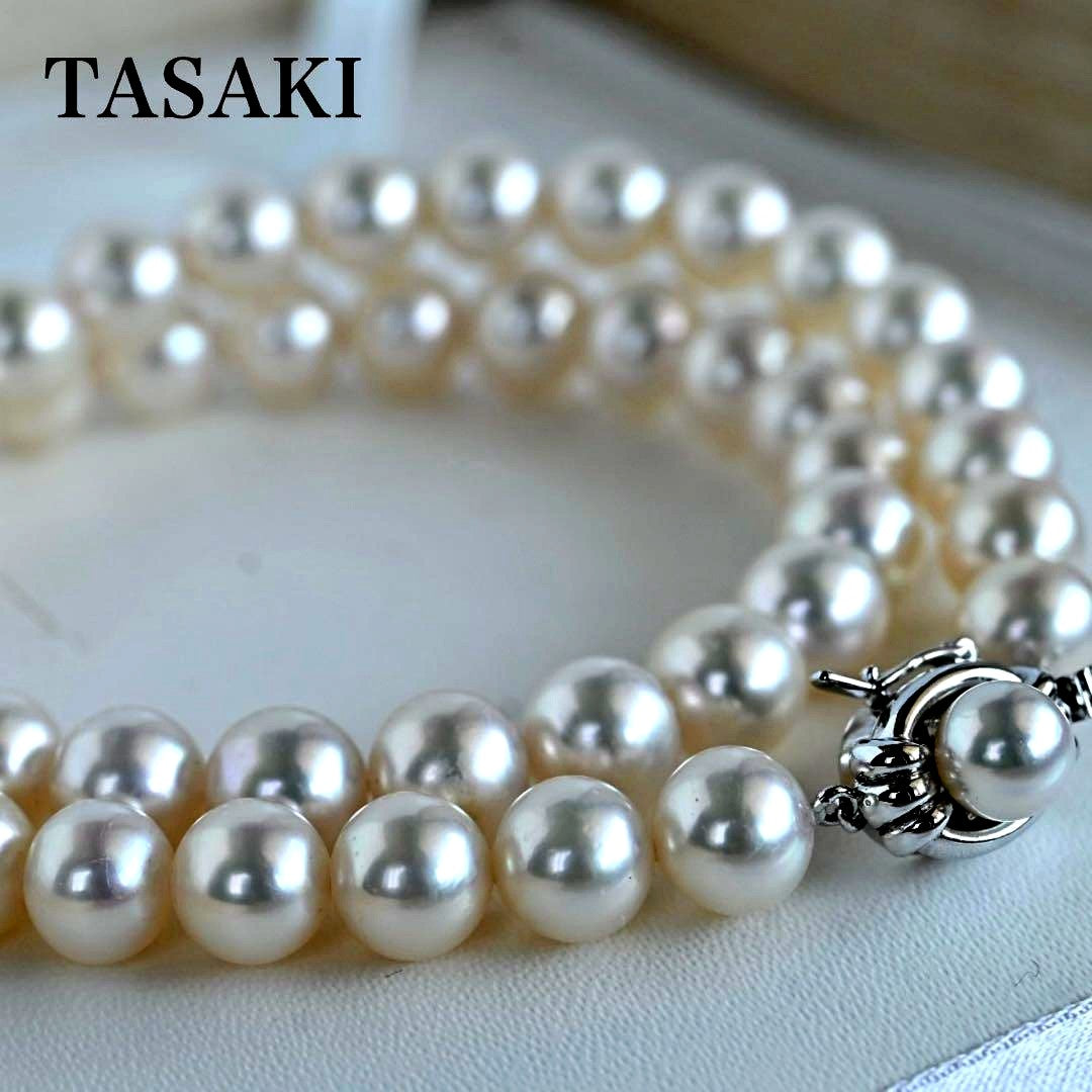 Hanadama Akoya pearl necklace with round 8-8.5mm pearls and silver fastener on a white background