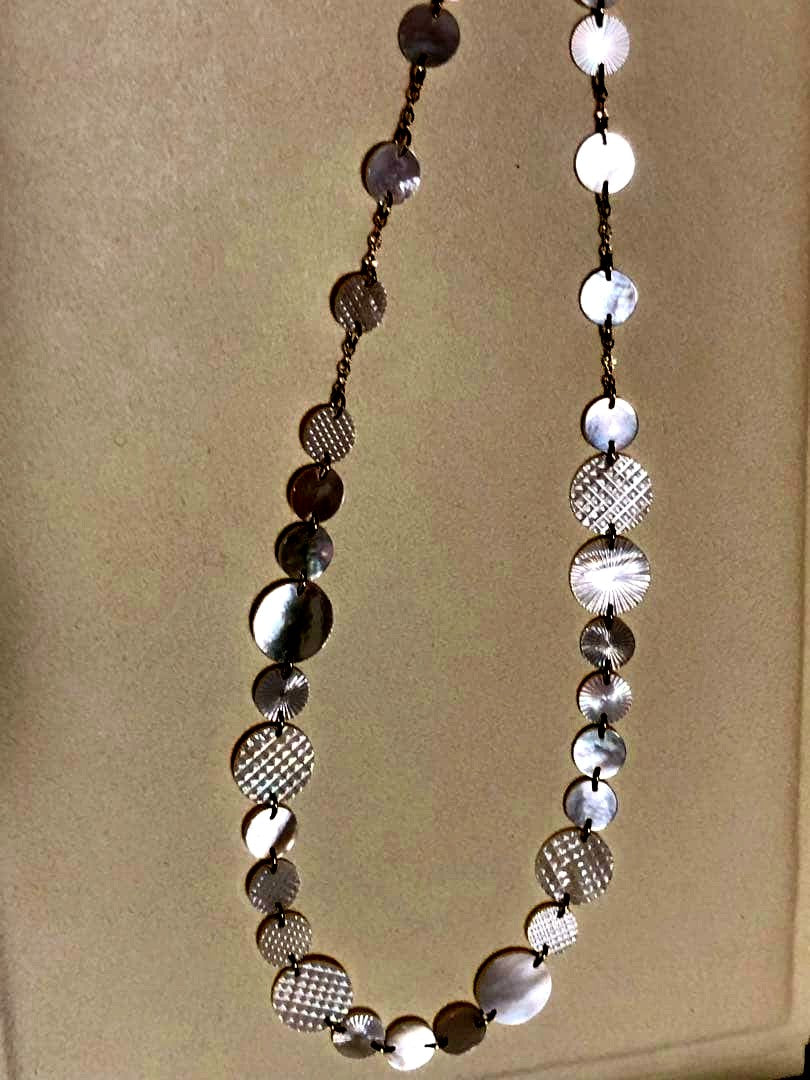 Agete white shell long necklace with silver and gold plated chain shown at 90cm length