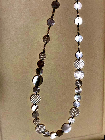 Agete white shell long necklace with silver and gold plated chain shown at 90cm length