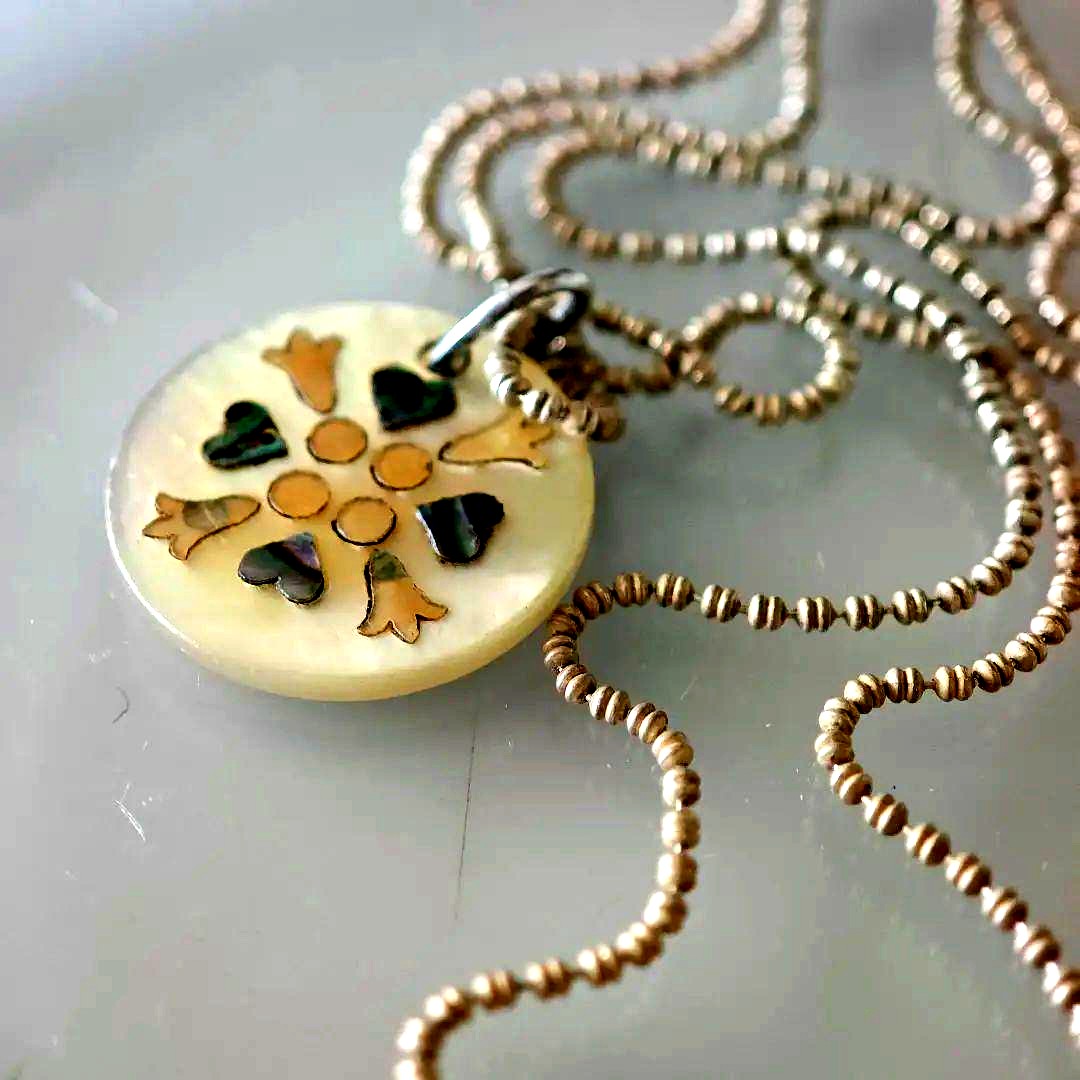 agetE shell charm necklace with heart and cross in sterling silver with white mother of pearl charm