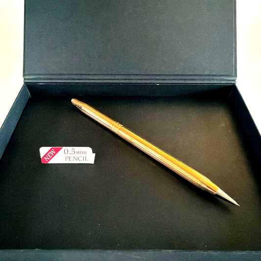 Cross brand 0.5mm gold color mechanical pencil shown on white background