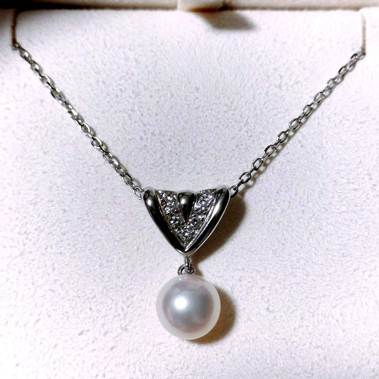 Mikimoto diamond and Akoya pearl necklace in 18K white gold with 7.8mm pearls and clasp markings