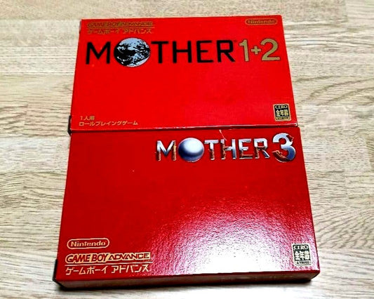 MOTHER3 and MOTHER1+2 game cartridges set with visible scratch on one cartridge