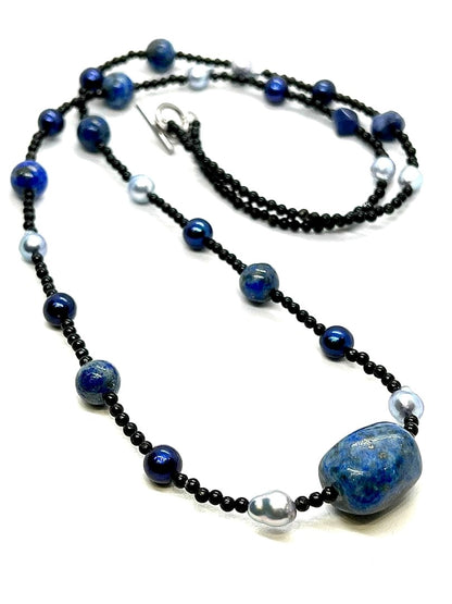 Akoya pearl necklace with large gray lapis lazuli beads on a black tourmaline chain, 80cm length