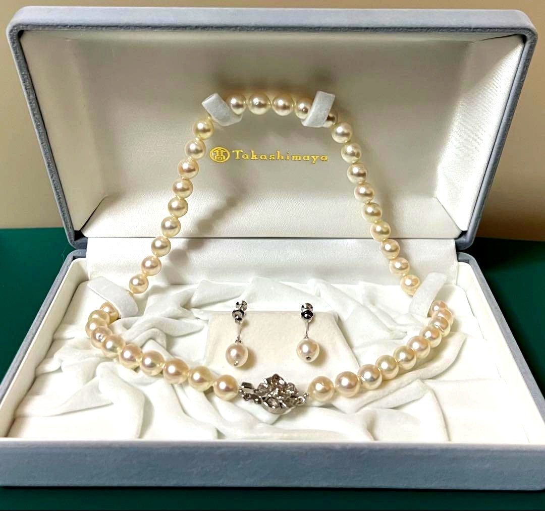 Takashimaya Akoya pearl necklace and earrings set featuring 8-8.5mm slightly pinkish and white pearls with silver clasp