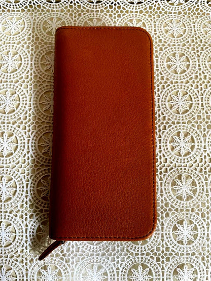PILOT Pen Specialized Round Zipper Pen Case in brown with two pockets and pig suede interior