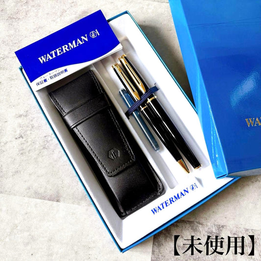 Waterman fountain pen and ballpoint pen set with leather case, displayed in original packaging with slight box discoloration