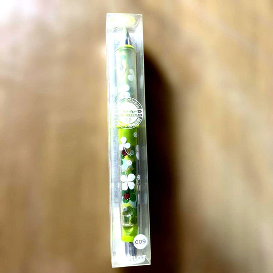 Pilot Dr.grip Tentenmushi pen with worn finish and deformed box on white background