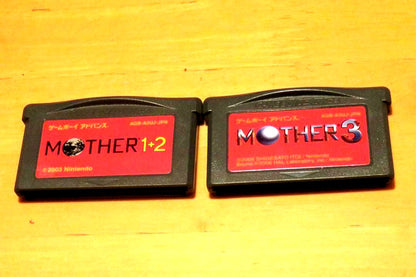 Mother 1+2 and 3 two-set game cartridges compatible with Nintendo DS Lite shown in packaging