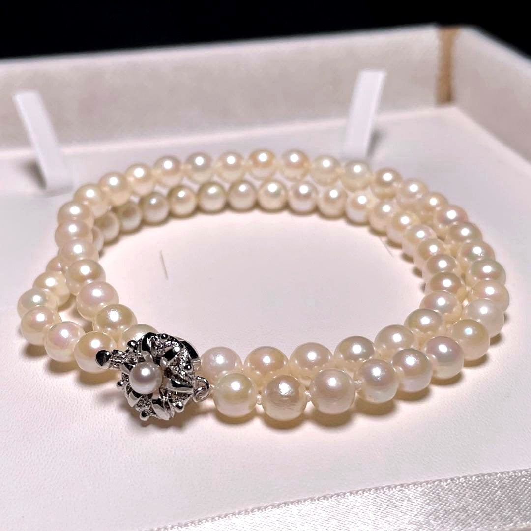Irregular Ise-Shima Akoya pearl necklace with 5.9-6.3mm round pearls on a silver chain, 42.2 cm long