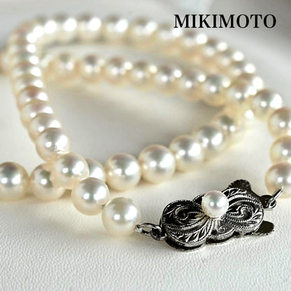 Highest Grade Mikimoto Hanadama Akoya Pearl Necklace with 5.5-6mm round pearls and silver clasp