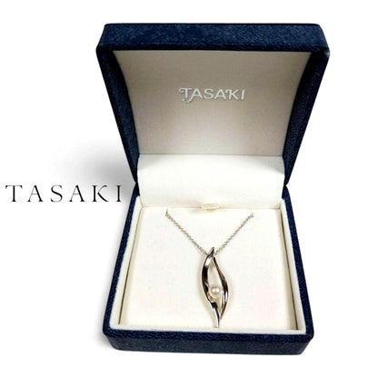 Tasaki Tahashi pearl pendant necklace featuring a 4.5 mm freshwater pearl on a 42 cm silver chain