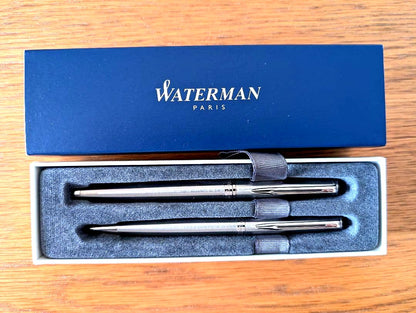 WATERMAN Paris ballpoint and rollerball pen set in silver stainless steel finish with included box