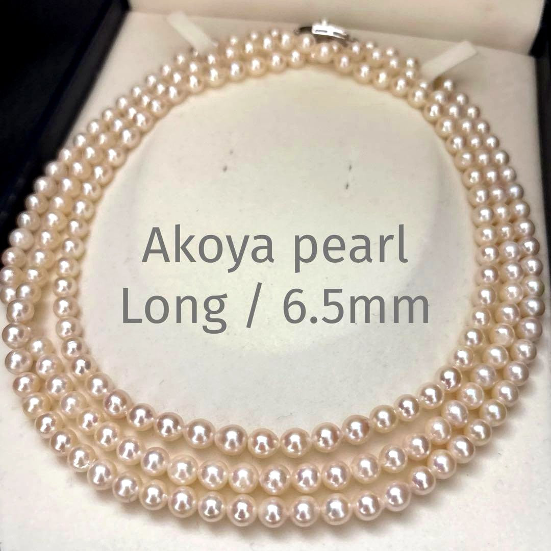 Long 125cm three-strand Akoya pearl necklace with 6.5mm pearls displayed on white background