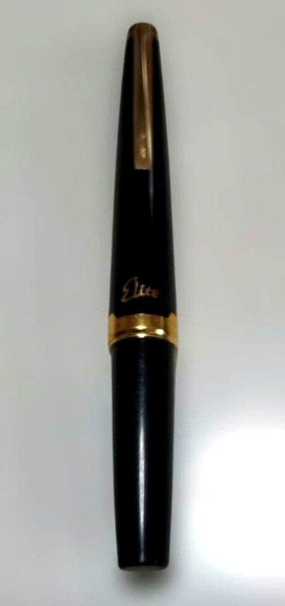 Black Pilot Elite fountain pen with resin body and gold plated accents shown with 14K586 nib
