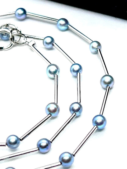 Akoya Pearl Indigo Blue Baby Pearl Station Necklace with silver parts and alloy clasp on white background