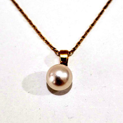 1880 Mikimoto pearl necklace with 7.6mm pearls on 18K yellow gold 40cm chain