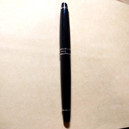 WATERMAN Expert Black Fountain Pen made of black resin with silver accents, shown capped
