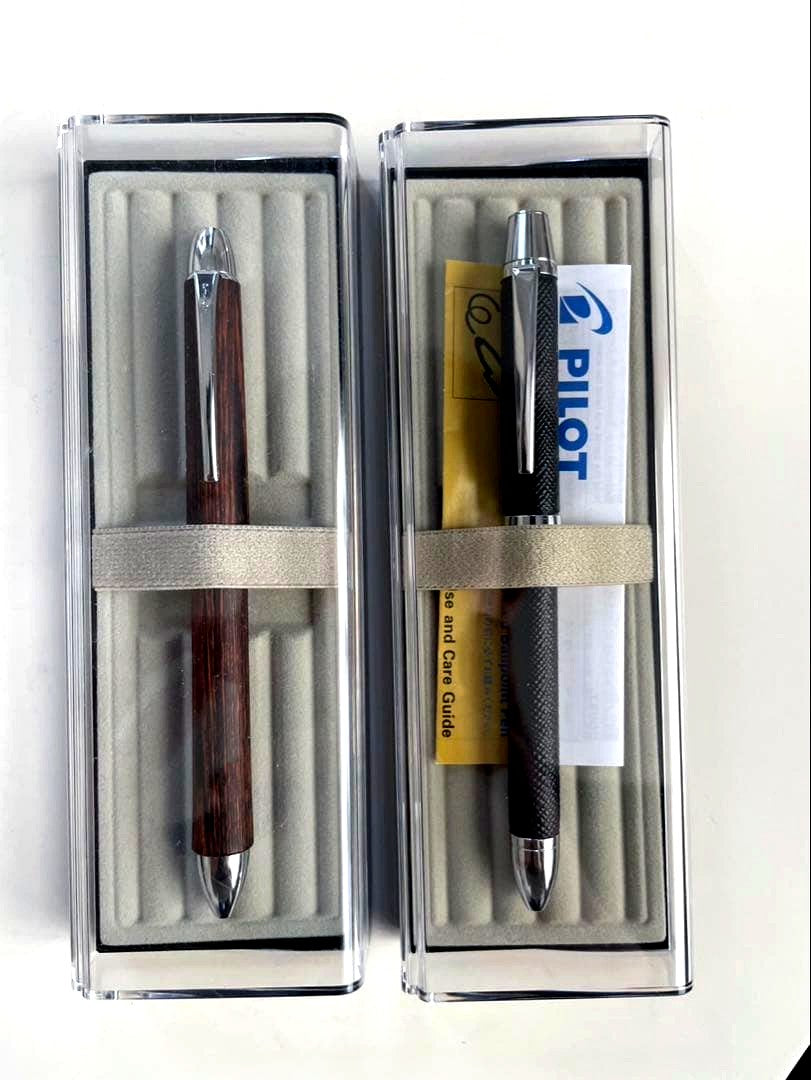 Pilot multi-function pen with wooden barrel shown angled on white background