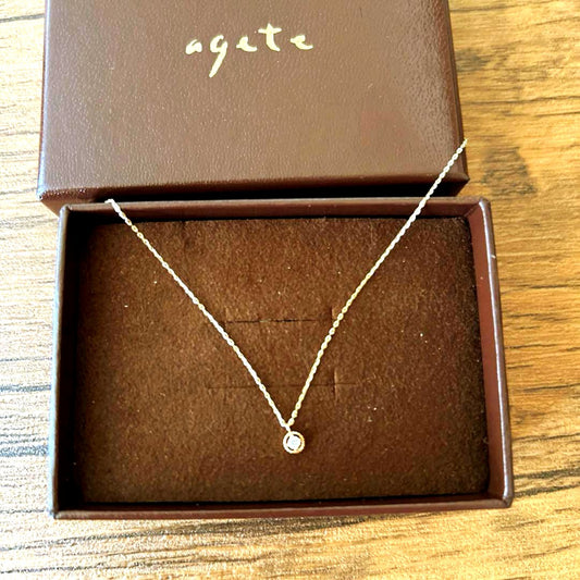 Agete Necklace featuring K10 gold with diamond decoration displayed on a white background