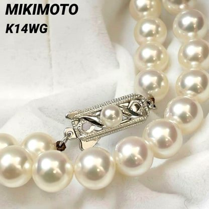 MIKIMOTO K14WG pearl necklace with 7.1 to 7.5mm pearls measuring about 41 inches with a K14WG clasp marked M