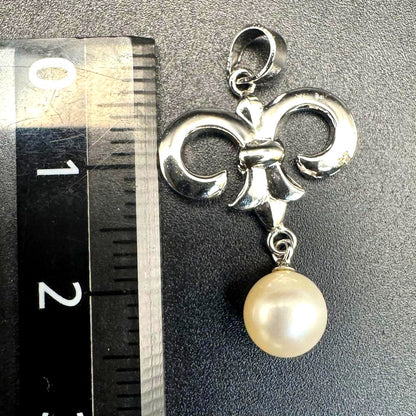 Mikimoto Akoya pearl necklace featuring 6.15 mm pearls on a 40 cm stainless steel chain with a delicate charm