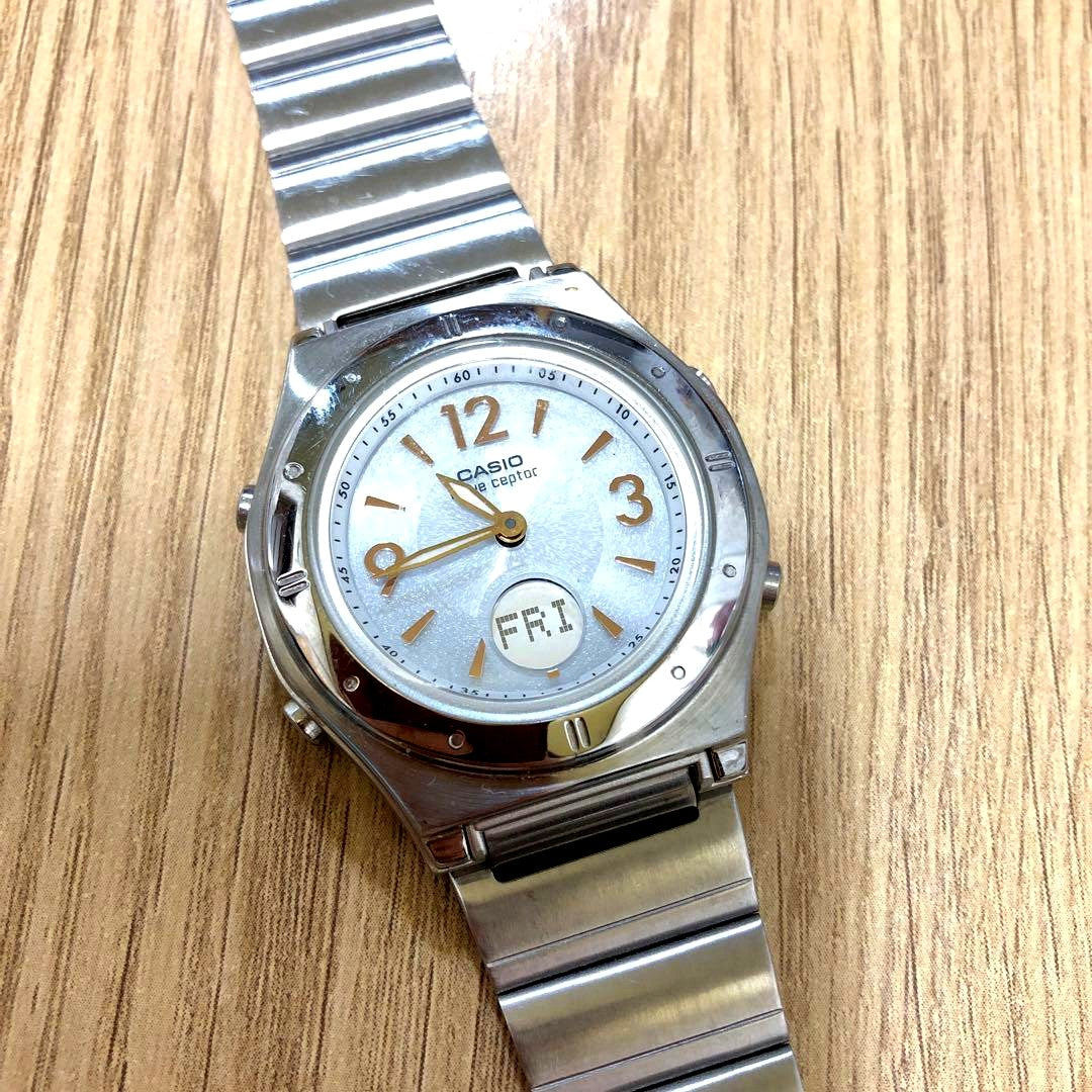 Casio Wave Ceptor LWA-M141 watch with white round dial and silver stainless steel band